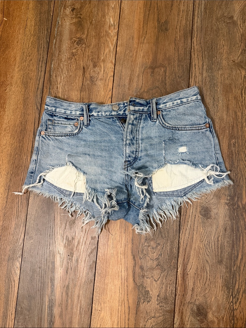 We The Free Light Blue Distressed Denim Cutoff Shorts